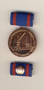 M 003 Medaille Verdienst Vorn.jpg